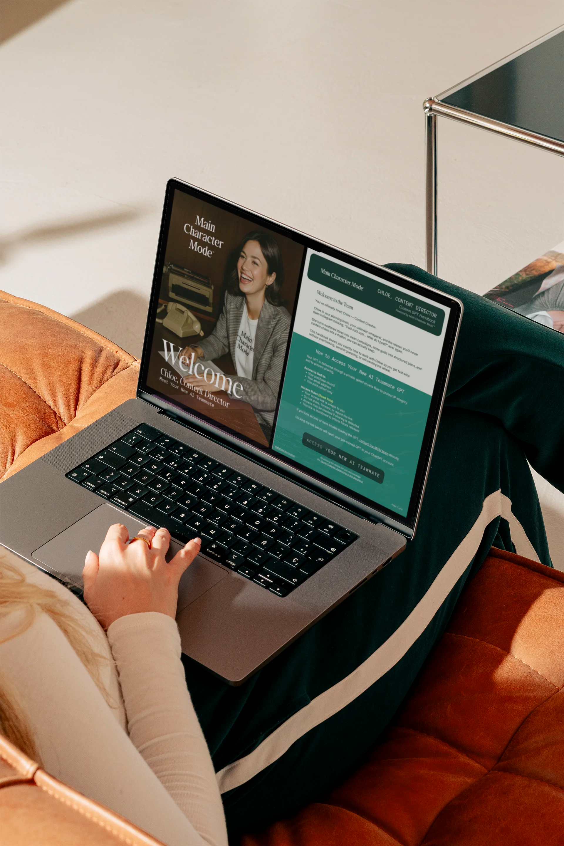 Person using a laptop on a couch with a website open on the screen